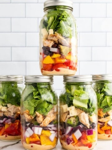 mason jar salad stacked on each other